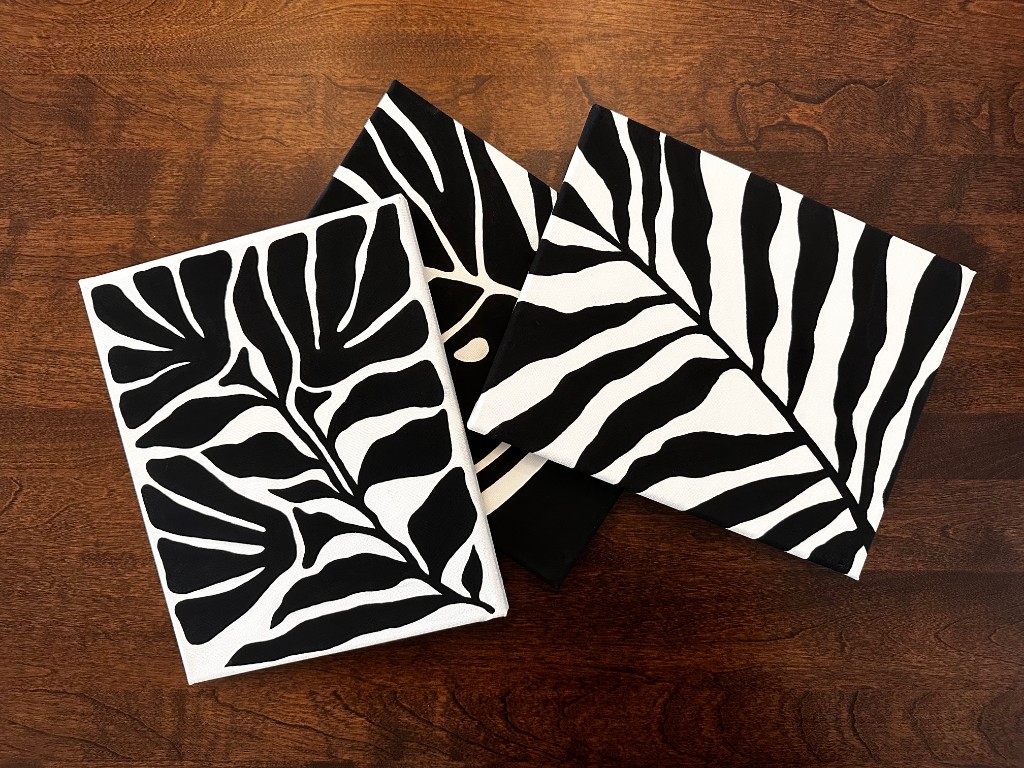 Noir Wilderness three-piece set on wood table
