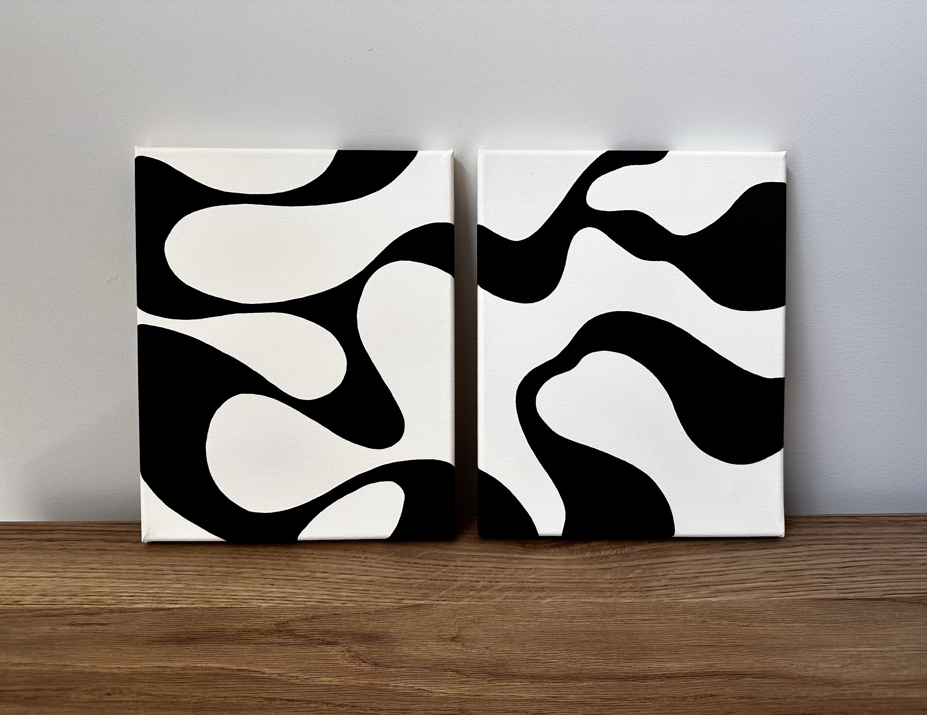 Shadow Garden two-piece set displayed on wood shelf against wall