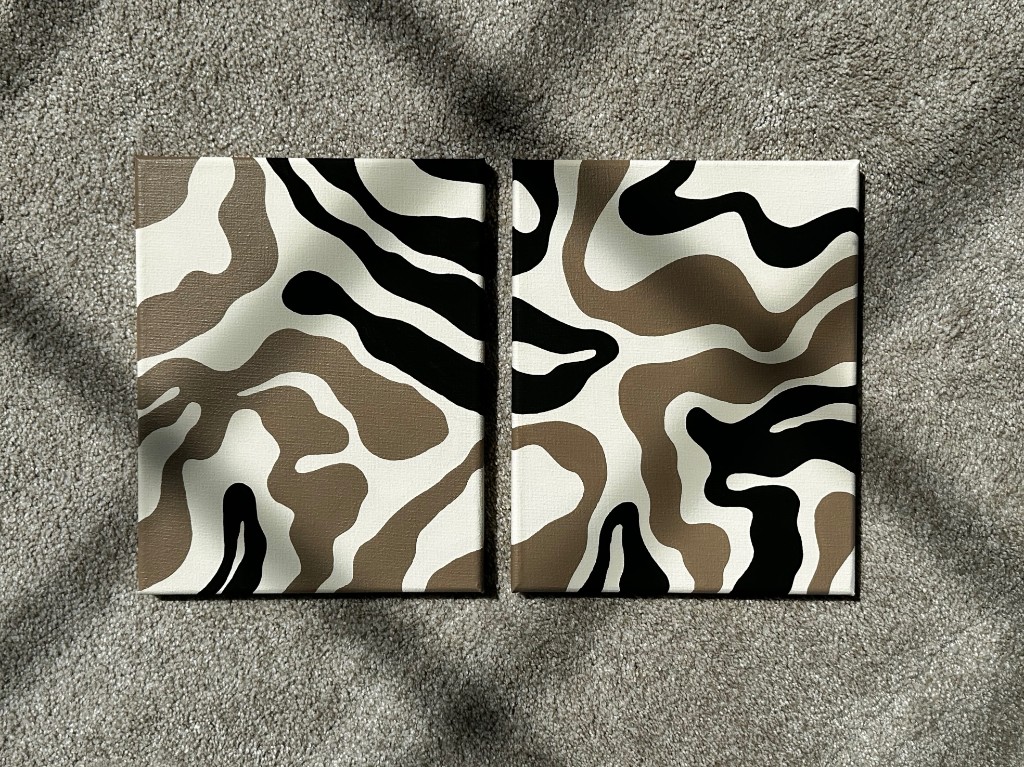 Shape of Earth two-piece set flat lay on carpet
