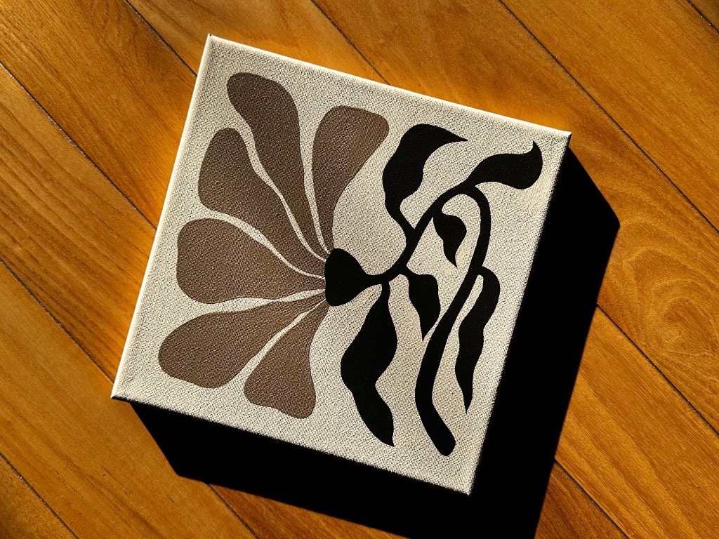 Sunlit Botanicals petals and vine painting on wood floor